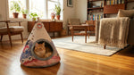 Cat relaxing inside Yin Yang teepee tent