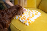 Dog sniffing treats from Sniffing Mat Light Woof